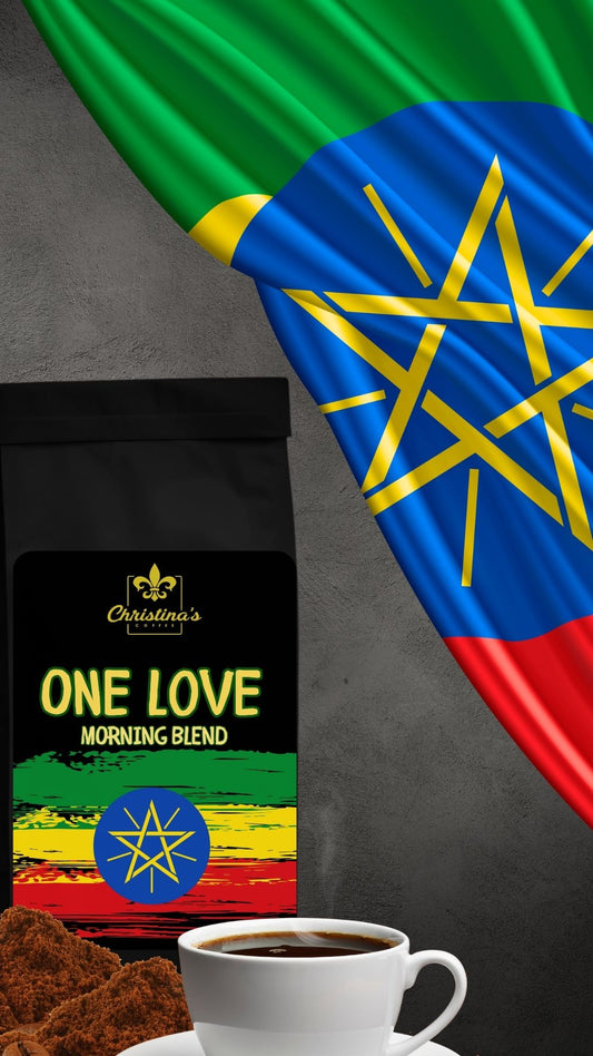 Christina's Coffee One Love medium roast coffee product placed in front of Ethiopian flag 